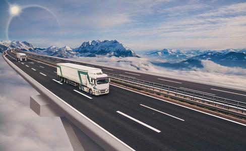 延伸公路延伸的高速公路与一辆货运卡车摄影图